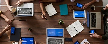 Business planning documents and laptop